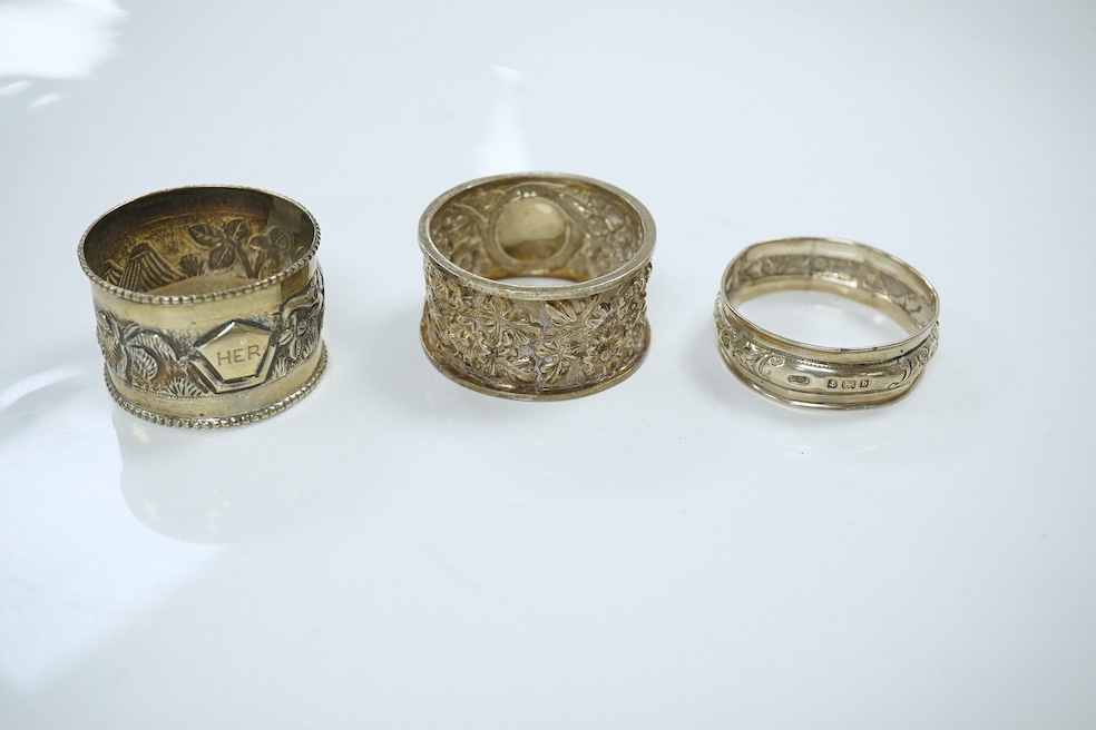 A group of assorted small silver and white metal wares including a white metal posy holder and an Indian white metal measuring cup, 9.5oz of hallmarked silver. Condition - fair to good.